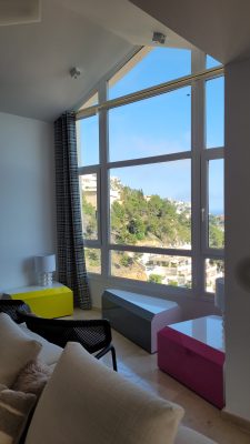 eyelet curtains in green for Altea hills apartment