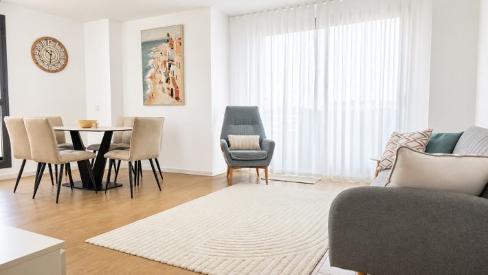 elegant white curtains hanging at a window in an apartment project