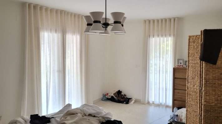 Linen curtains by maisondecor hanging in Altea